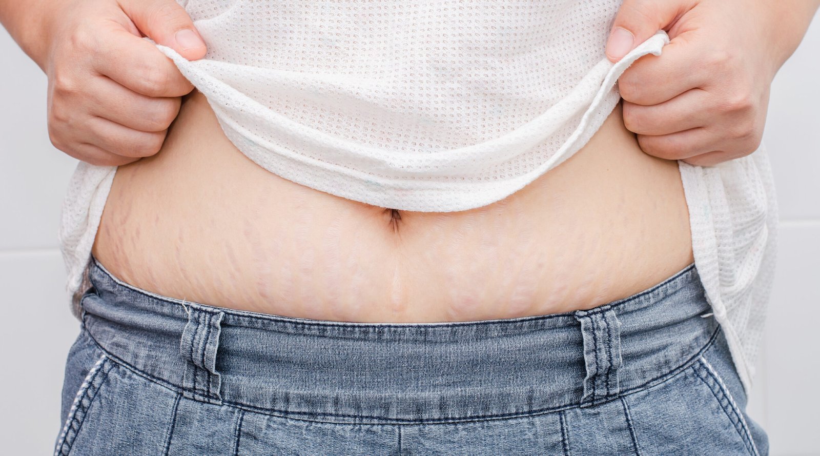 Woman testing her skin showing no.