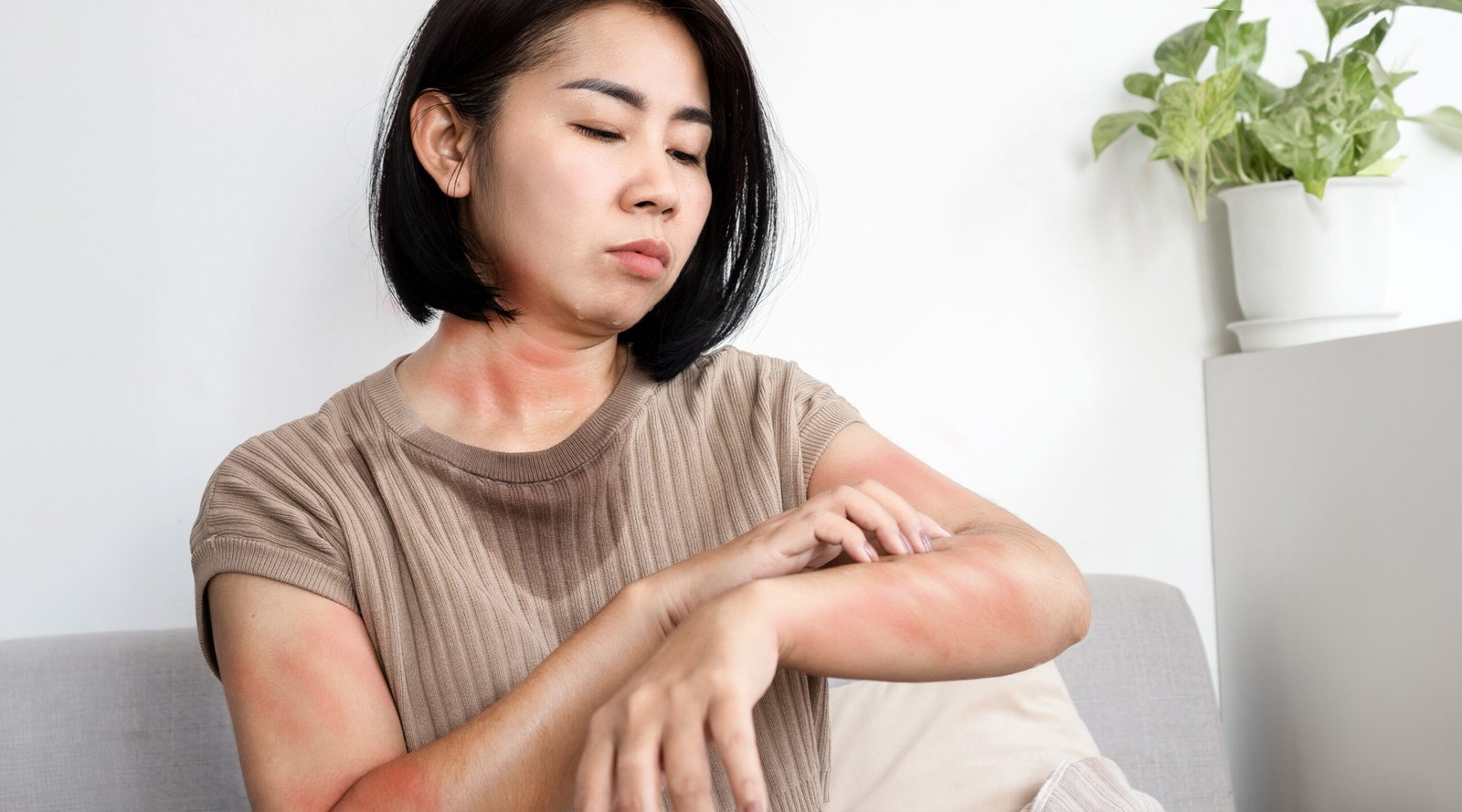 Asian woman has allergic her own.