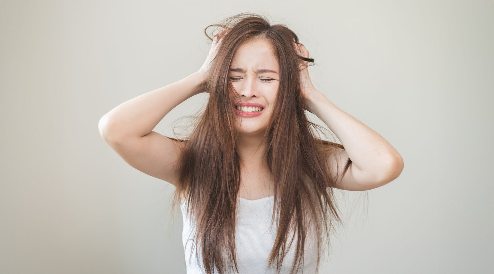 Asian woman hair having problem dandruff.