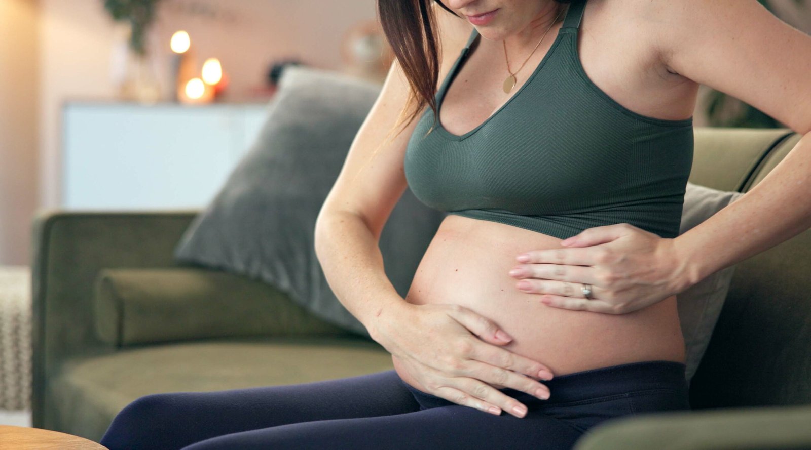 Product skin care hand pregnant woman.